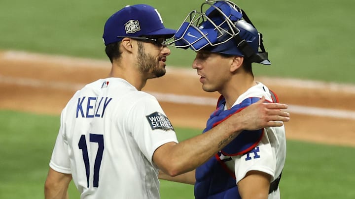 Oct 20, 2020; Arlington, Texas, USA; Los Angeles Dodgers relief pitcher Joe Kelly (17) and Los Angeles Dodgers catcher Austin Barnes (15) celebrate after defeating the Tampa Bay Rays in game one of the 2020 World Series at Globe Life Field. Mandatory Credit: Kevin Jairaj-Imagn Images