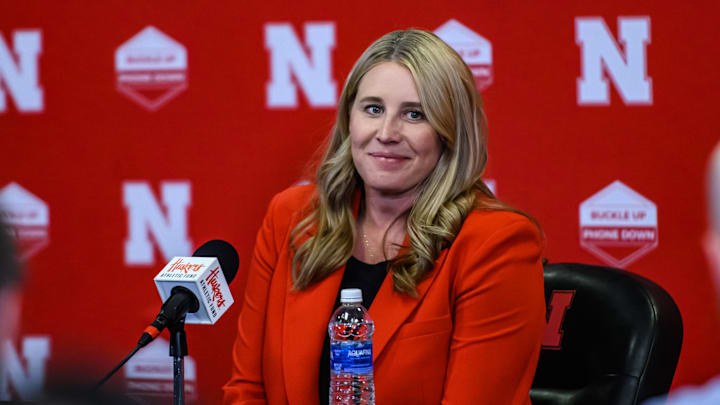 Dani Busboom Kelly speaks to the media. 