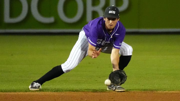 GCU infielder Jacob Wilson (2) fields a ball GCU infielder Jacob Wilson (2) fields a ball