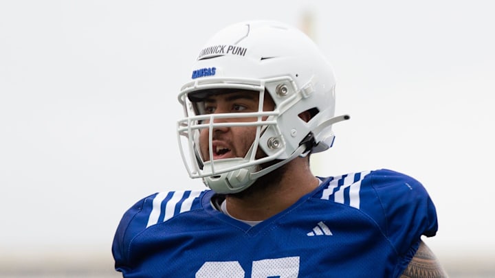 Kansas offensive lineman Dominick Puni (67)