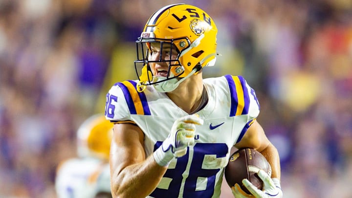 Mason Taylor 86 runs the ball as the LSU Tigers take on the Ole Miss Rebels at Tiger Stadium in Baton Rouge, Louisiana, on Oct. 12, 2024 Mason Taylor 86 runs the ball as the LSU Tigers take on the Ole Miss Rebels at Tiger Stadium in Baton Rouge, Louisiana, on Oct. 12, 2024