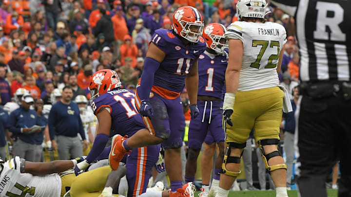 Nov 11, 2023; Clemson, South Carolina, USA; Clemson Tigers defensive lineman Peter Woods (11) reacts after tackling Georgia Tech Yellow Jackets quarterback Haynes King (10) during the third quarter at Memorial Stadium. Mandatory Credit: Ken Ruinard-Imagn Images