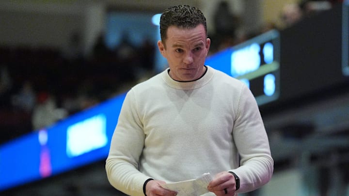 Tappan Zee coach George Gaine walks the sideline during the New York State boys basketball semifinal game against Peekskill at the Westchester County Center in White Plains on March 4.