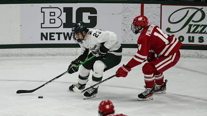 MSU's Shane Vansaghi moves the puck against Wisconsin, Thursday, Jan. 2, 2024, at Munn Ice Arena. MSU won 4-3.