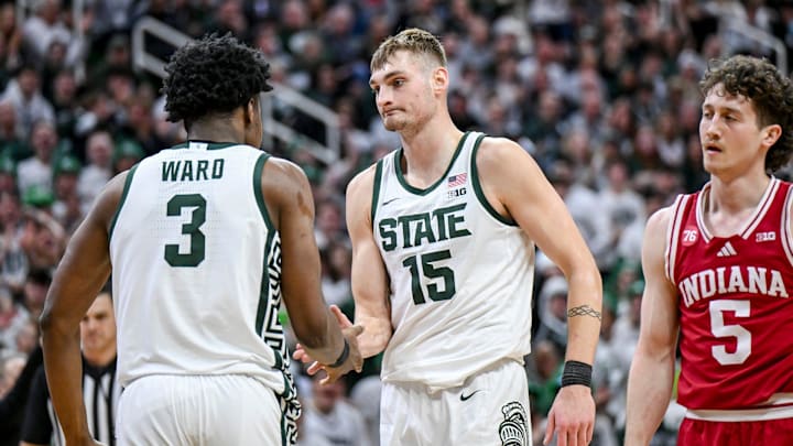 Michigan State's Carson Cooper, right, celebrates with Cam Ward, left, after Ward's score an Indiana foul during the second half on Tuesday, Jan. 13, 2026, at the Breslin Center in East Lansing.