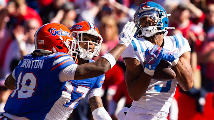 Mississippi Rebels wide receiver Tre Harris (9) hauls in a touchdown pass during the first half at Ben Hill Griffin Stadium in Gainesville, FL on Saturday, November 23, 2024. [Doug Engle/Gainesville Sun]
