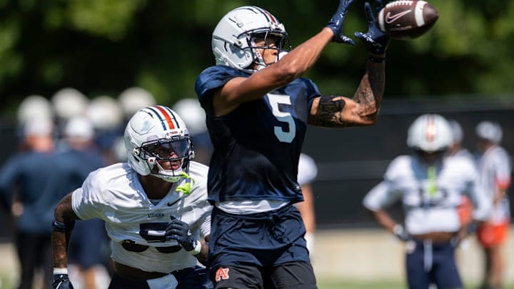 Auburn Tigers wide receiver Horatio Fields (5) catches a pass during practice at Woltosz Football Performance Center in Auburn, Ala. on Tuesday, Aug. 19, 2025.
