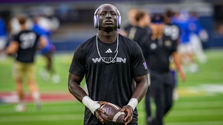 Running back Adam Mohammed warms up for the LA Bowl, his last game as a Husky. Running back Adam Mohammed warms up for the LA Bowl, his last game as a Husky.
