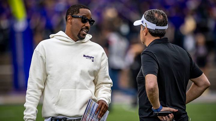 Kevin Cummings is shown huddling with Jedd Fisch during the Spring Game. Kevin Cummings is shown huddling with Jedd Fisch during the Spring Game.