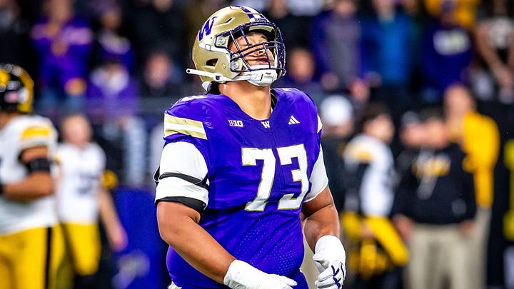 Husky offensive guard Champ Taulealea has a wistful moment in the Iowa game. Husky offensive guard Champ Taulealea has a wistful moment in the Iowa game.