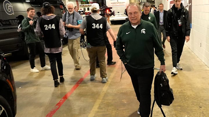 Michigan State basketball coach Tom Izzo arrives off the team bus at 8 pm for their 2026 NCAA Men's Basketball East Regional game against UConn at Capital One Arena in Washington DC on Friday, March 27, 2026.