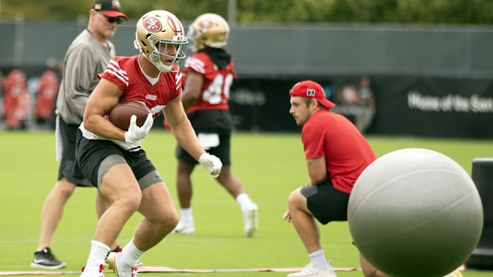 Jul 24, 2025; Santa Clara, CA, USA; San Francisco 49ers running back Christian McCaffrey (23) runs through an obstacle course during the second day of training camp. Mandatory Credit: D. Ross Cameron-Imagn Images