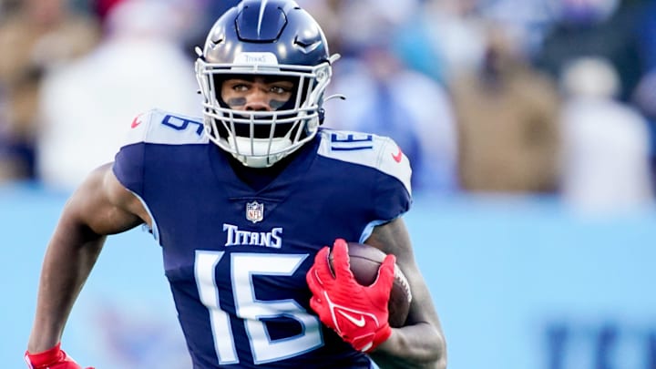 Tennessee Titans rookie wide receiver Treylon Burks (16) picks up a first down against Houston Texans during action at Nissan Stadium in Nashville, on Dec. 24, 2022. Tennessee Titans rookie wide receiver Treylon Burks (16) picks up a first down against Houston Texans during action at Nissan Stadium in Nashville, on Dec. 24, 2022.