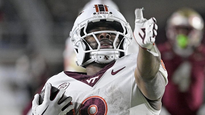 Nov 15, 2025; Tallahassee, Florida, USA; Virginia Tech Hokies running back Terion Stewart (8) celebrates a first down during the first half against the Florida State Seminoles at Doak S. Campbell Stadium. Mandatory Credit: Melina Myers-Imagn Images