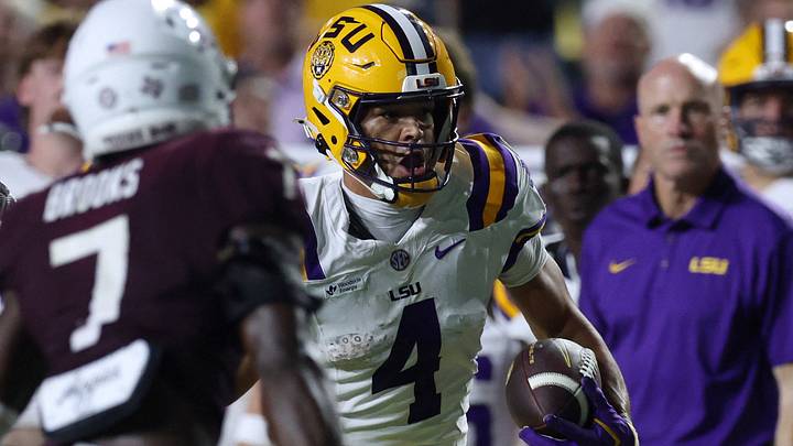 LSU Tigers wide receiver Jackson Harris (4) runs the ball during the third quarter against the Texas A&M Aggies at Tiger Stadium. LSU Tigers wide receiver Jackson Harris (4) runs the ball during the third quarter against the Texas A&M Aggies at Tiger Stadium.