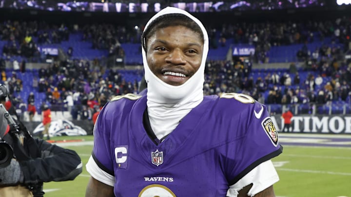 Baltimore Ravens quarterback Lamar Jackson celebrates after defeating the Pittsburgh Steelers.