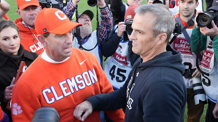 Clemson head coach Dabo Swinney and South Carolina Head Coach Shane Beamer talk after the Tigers’ 28-14 win at Williams-Brice Stadium in Columbia, S.C. Saturday, November 29, 2025.