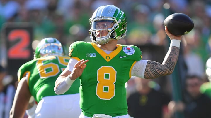 Jan 1, 2025; Pasadena, CA, USA; Oregon Ducks quarterback Dillon Gabriel (8) passes in the first quarter against the Ohio State Buckeyes in the 2025 Rose Bowl college football quarterfinal game at Rose Bowl Stadium. Mandatory Credit: Gary A. Vasquez-Imagn Images Jan 1, 2025; Pasadena, CA, USA; Oregon Ducks quarterback Dillon Gabriel (8) passes in the first quarter against the Ohio State Buckeyes in the 2025 Rose Bowl college football quarterfinal game at Rose Bowl Stadium. Mandatory Credit: Gary A. Vasquez-Imagn Images