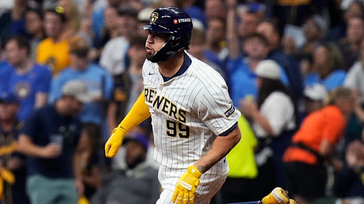 Oct 3, 2024; Milwaukee, Wisconsin, USA; Milwaukee Brewers catcher Gary Sanchez (99) doubles on a sharp line drive to New York Mets left fielder Brandon Nimmo (9) during the second inning of Game 3 of National League wild-card series on Thursday October 3, 2024 at American Family Field in Milwaukee, Wis. Mandatory Credit: 