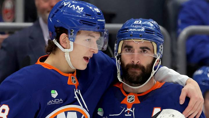 Oct 21, 2025; Elmont, New York, USA; New York Islanders defenseman Matthew Schaefer (48) talks to center Kyle Palmieri (21) during the second period against the San Jose Sharks at UBS Arena. Mandatory Credit: Brad Penner-Imagn Images
