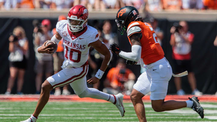 Sep 7, 2024; Stillwater, Oklahoma, USA; Arkansas Razorbacks quarterback Taylen Green (10) runs the ball during the third quarter against the Oklahoma State Cowboys at Boone Pickens Stadium. Mandatory Credit: William Purnell-Imagn Images