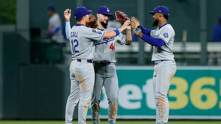 Aug 19, 2025; Denver, Colorado, USA; Los Angeles Dodgers left fielder Alex Call (12) and center fielder Andy Pages (44) and right fielder Teoscar Hernandez (37) celebrate after the game against the Colorado Rockies at Coors Field. Mandatory Credit: Isaiah J. Downing-Imagn Images Aug 19, 2025; Denver, Colorado, USA; Los Angeles Dodgers left fielder Alex Call (12) and center fielder Andy Pages (44) and right fielder Teoscar Hernandez (37) celebrate after the game against the Colorado Rockies at Coors Field. Mandatory Credit: Isaiah J. Downing-Imagn Images
