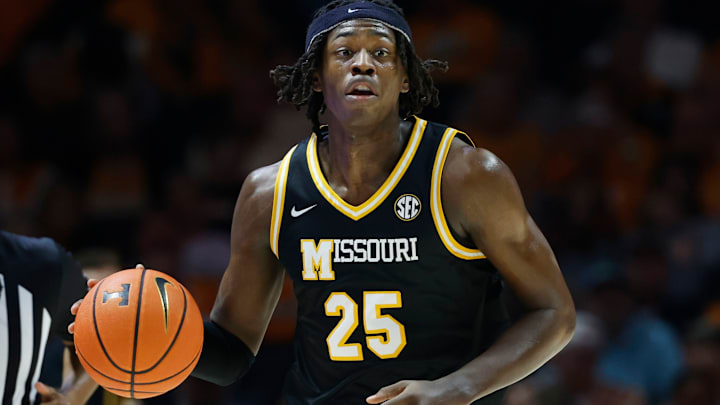 Missouri Tigers forward Mark Mitchell (25) looks to facilitate the offense, in a game versus the Tennessee Volunteers this season.