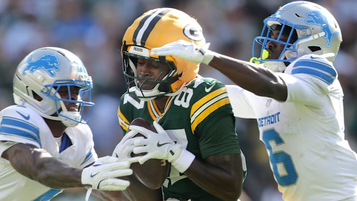 Green Bay Packers wide receiver Romeo Doubs catches a pass against Detroit Lions cornerback D.J. Reed (4) and cornerback Terrion Arnold (6) on Sunday, September 7, 2025, at Lambeau Field in Green Bay, Wis. Green Bay Packers wide receiver Romeo Doubs catches a pass against Detroit Lions cornerback D.J. Reed (4) and cornerback Terrion Arnold (6) on Sunday, September 7, 2025, at Lambeau Field in Green Bay, Wis.