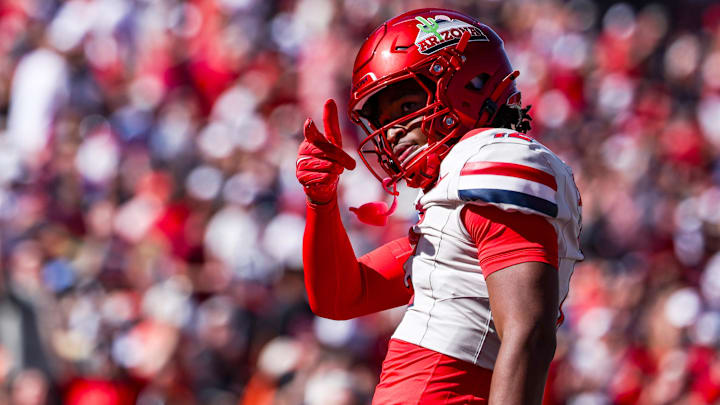 Oct 4, 2025; Tucson, Arizona, USA; Arizona Wildcats wide receiver Tre Spivey (12) celebrates after a play during the third quarter of the game against the Oklahoma State Cowboys at Arizona Stadium. Mandatory Credit: Aryanna Frank-Imagn Images