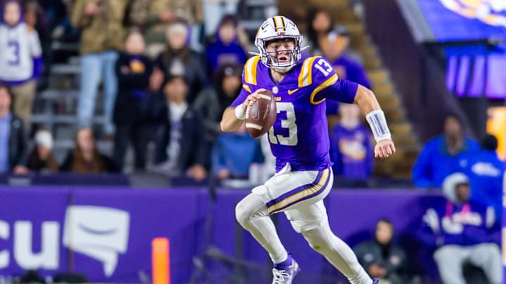 Tigers quarterback Garrett Nussmeier 13 runs the ball as the LSU Tigers take on the Oklahoma Sooners. Nov 30, 2024; Baton Rouge, Louisiana, USA; at Tiger Stadium. Tigers quarterback Garrett Nussmeier 13 runs the ball as the LSU Tigers take on the Oklahoma Sooners. Nov 30, 2024; Baton Rouge, Louisiana, USA; at Tiger Stadium.