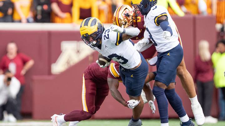 Oct 3, 2026; Minneapolis, Minnesota, USA; Michigan Wolverines running back Jordan Marshall (23) runs with the ball against the Minnesota Golden Gophers in the fourth quarter at Huntington Bank Stadium. Mandatory Credit: Matt Blewett-Imagn Images Oct 3, 2026; Minneapolis, Minnesota, USA; Michigan Wolverines running back Jordan Marshall (23) runs with the ball against the Minnesota Golden Gophers in the fourth quarter at Huntington Bank Stadium. Mandatory Credit: Matt Blewett-Imagn Images