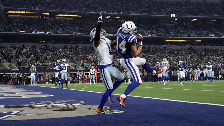 Dec 4, 2022; Arlington, Texas, USA; Indianapolis Colts wide receiver Alec Pierce (14) catches a touchdown pass Dallas Cowboys cornerback Kelvin Joseph (1) defends during the second half at AT&T Stadium. Mandatory Credit: Kevin Jairaj-USA TODAY Sports