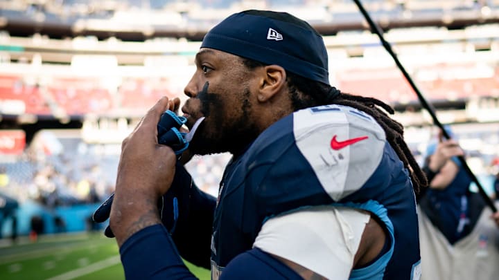 Tennessee Titans running back Derrick Henry (22) blows kisses to fans as he exits the field after defeating Jacksonville Jaguars 28-20 at Nissan Stadium in Nashville, Tenn., Sunday, Jan. 7, 2024.