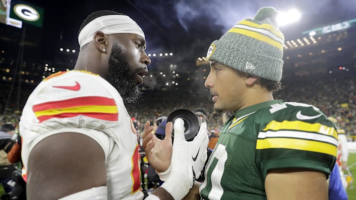 Dec 3, 2023; Green Bay, Wisconsin, USA; Green Bay Packers quarterback Jordan Love (10) talks with Kansas City Chiefs defensive end Charles Omenihu (90) following the Packers 27-19 victory at Lambeau Field. Mandatory Credit: Wm. Glasheen-Imagn Images