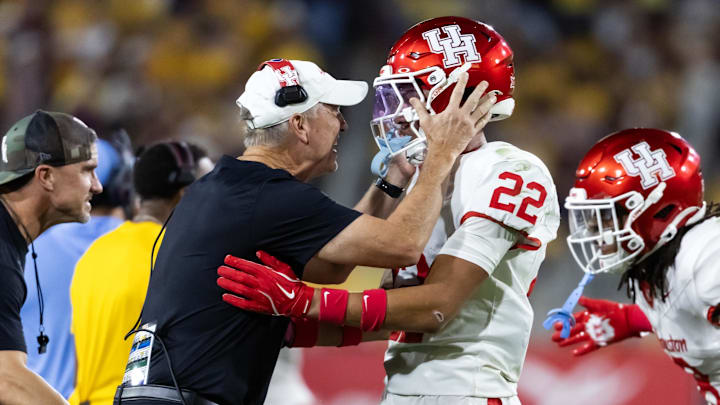 Oct 25, 2025; Tempe, Arizona, USA; Houston Cougars head coach Willie Fritz celebrates a play with defensive back Marc Stampley II (22) against the Arizona State Sun Devils at Mountain America Stadium. Mandatory Credit: Mark J. Rebilas-Imagn Images