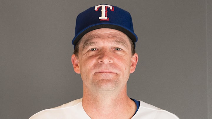 Feb 21, 2023; Surprise, AZ, USA; Texas Rangers coach Tim Hyers (75) poses for a photo during photo day at Surprise Stadium. Mandatory Credit: Allan Henry-Imagn Images