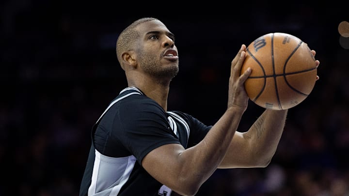 Dec 23, 2024; Philadelphia, Pennsylvania, USA; San Antonio Spurs guard Chris Paul (3) shoots a foul shot against the Philadelphia 76ers during the fourth quarter at Wells Fargo Center. Mandatory Credit: Bill Streicher-Imagn Images