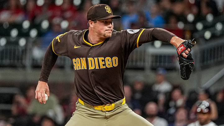 Jul 21, 2026; Cumberland, Georgia, USA; San Diego Padres pitcher Mason Miller (22) pitches against the Atlanta Braves during the ninth inning at Truist Park. Mandatory Credit: Dale Zanine-Imagn Images