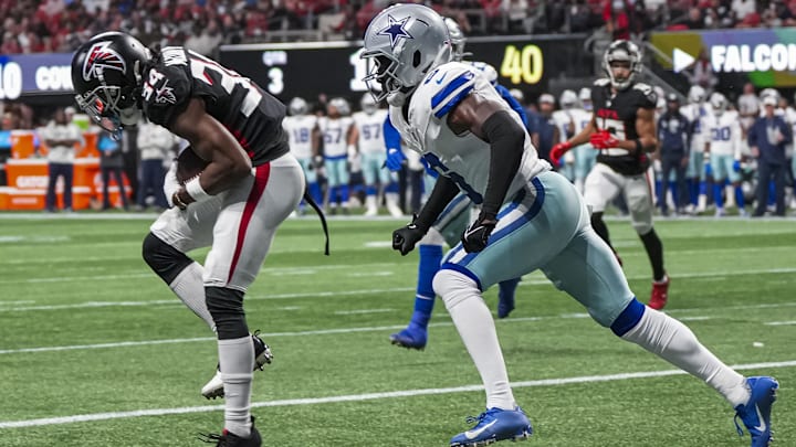 Atlanta Falcons wide receiver Ray-Ray McCloud III catches a touchdown pass in front of Dallas Cowboys safety Donovan Wilson.