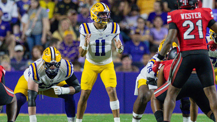 Nov 22, 2025; Baton Rouge, Louisiana, USA;  LSU Tigers quarterback Michael van Buren Jr. (11) calls for the ball against the Western Kentucky Hilltoppers during the first half at Tiger Stadium. Mandatory Credit: Stephen Lew-Imagn Images