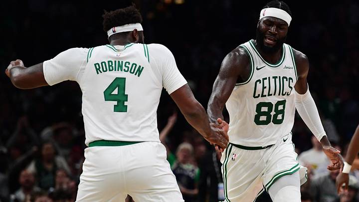 Oct 14, 2026; Boston, Massachusetts, USA; Boston Celtics center Neemias Queta (88) is congratulated by Boston Celtics center Mitchell Robinson (4) after making a basket during the second half against the Charlotte Hornets at TD Garden. Mandatory Credit: Bob DeChiara-Imagn Images Oct 14, 2026; Boston, Massachusetts, USA; Boston Celtics center Neemias Queta (88) is congratulated by Boston Celtics center Mitchell Robinson (4) after making a basket during the second half against the Charlotte Hornets at TD Garden. Mandatory Credit: Bob DeChiara-Imagn Images