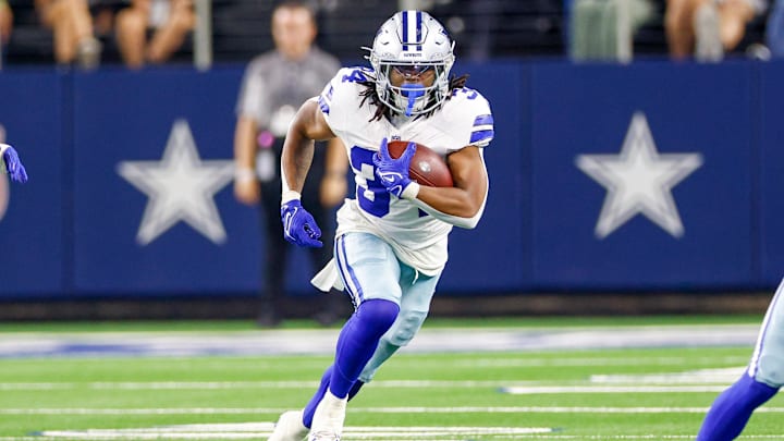 Dallas Cowboys running back Jaydon Blue carries the ball during the fourth quarter against the Atlanta Falcons.