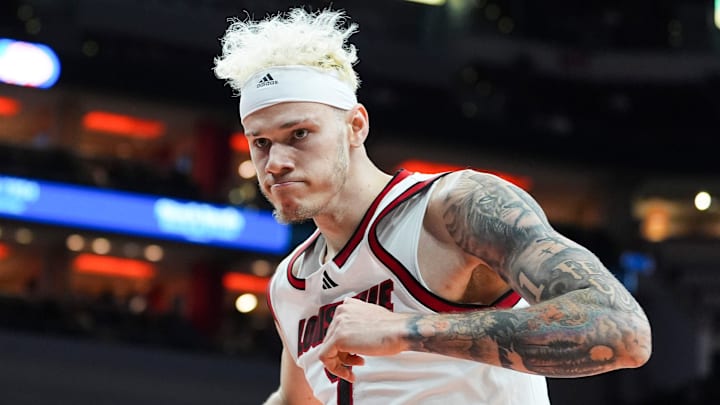 Louisville Cardinals forward Kasean Pryor (7) flexes after a first half slam dunk against Spalding University in the Cards' second exhibition game at the KFC Yum! Center in Louisville, Kentucky Monday, Oct. 28, 2024. Louisville Cardinals forward Kasean Pryor (7) flexes after a first half slam dunk against Spalding University in the Cards' second exhibition game at the KFC Yum! Center in Louisville, Kentucky Monday, Oct. 28, 2024.