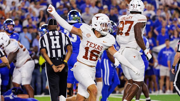 Texas Longhorns defensive back Michael Taaffe (16) celebrates after the Kentucky Wildcats fail to score during overtime at Kroger Field.