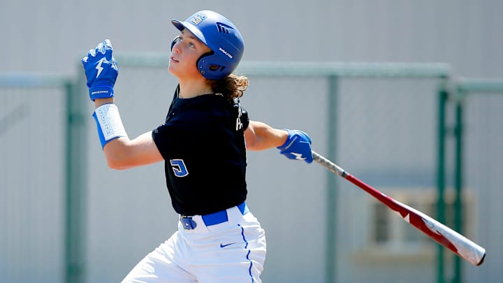 Ethan Holliday hits during a Stillwater High School baseball game in Stillwater, Okla., Saturday, April 30, 2022.