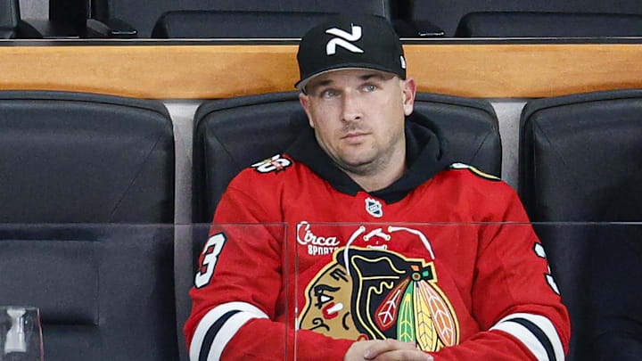 Jan 12, 2026; Chicago, Illinois, USA; Chicago Cubs third baseman Alex Bregman watches an NHL game between the Chicago Blackhawks and Edmonton Oilers during the third period at United Center. Mandatory Credit: Kamil Krzaczynski-Imagn Images