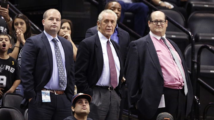 Oct 18, 2014; San Antonio, TX, USA; Miami Heat president Pat Riley (center) watches from the stands during the second half against the San Antonio Spurs at AT&T Center. The Heat won 111-108 in overtime. Mandatory Credit: Soobum Im-Imagn Images