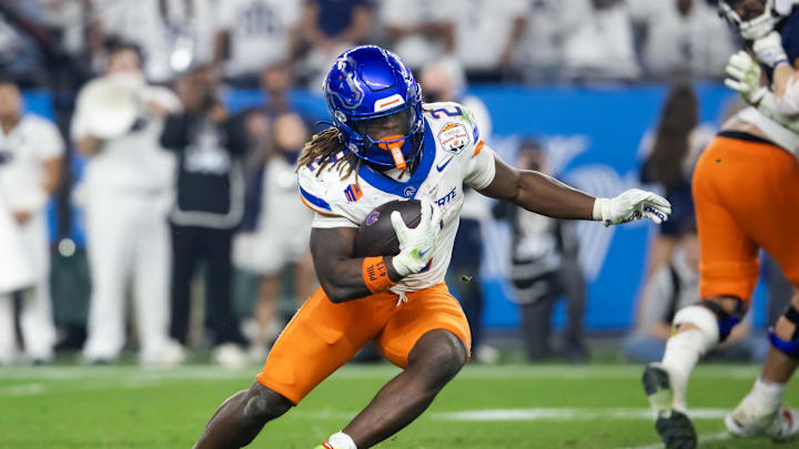 Dec 31, 2024; Glendale, AZ, USA; Boise State Broncos running back Ashton Jeanty (2) against the Penn State Nittany Lions during the Fiesta Bowl at State Farm Stadium. Mandatory Credit: Mark J. Rebilas-Imagn Images