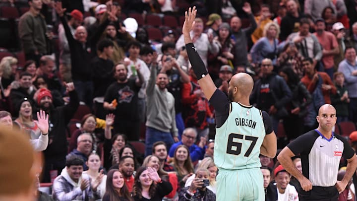 Dec 13, 2024; Chicago, Illinois, USA; Charlotte Hornets forward Taj Gibson (67), a former Chicago Bulls player, waves to the crowd during the second half at the United Center. Mandatory Credit: Matt Marton-Imagn Images