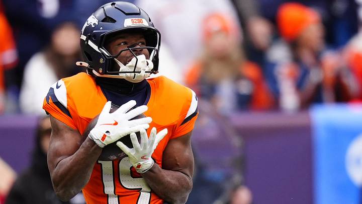 Jan 25, 2026; Denver, CO, USA; Denver Broncos wide receiver Marvin Mims Jr. (19) makes a catch against the New England Patriots during the first half in the 2026 AFC Championship Game at Empower Field at Mile High. Mandatory Credit: Ron Chenoy-Imagn Images